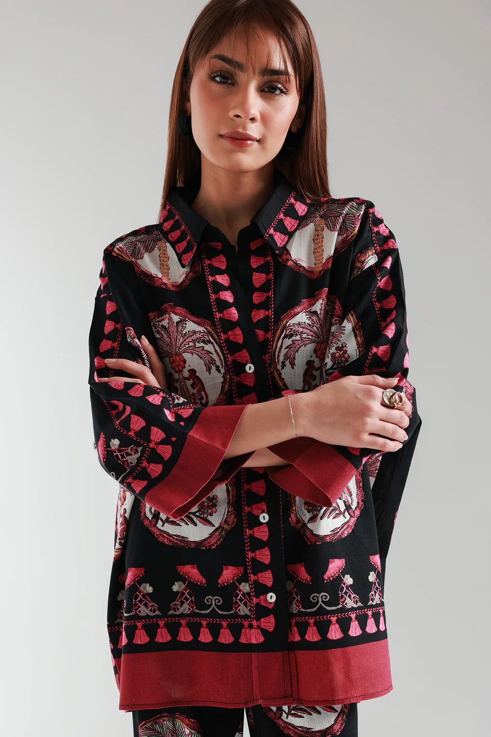Front studio portrait of Biljiki deep black and maroon floral two-piece culotte set on a 5'6 model.