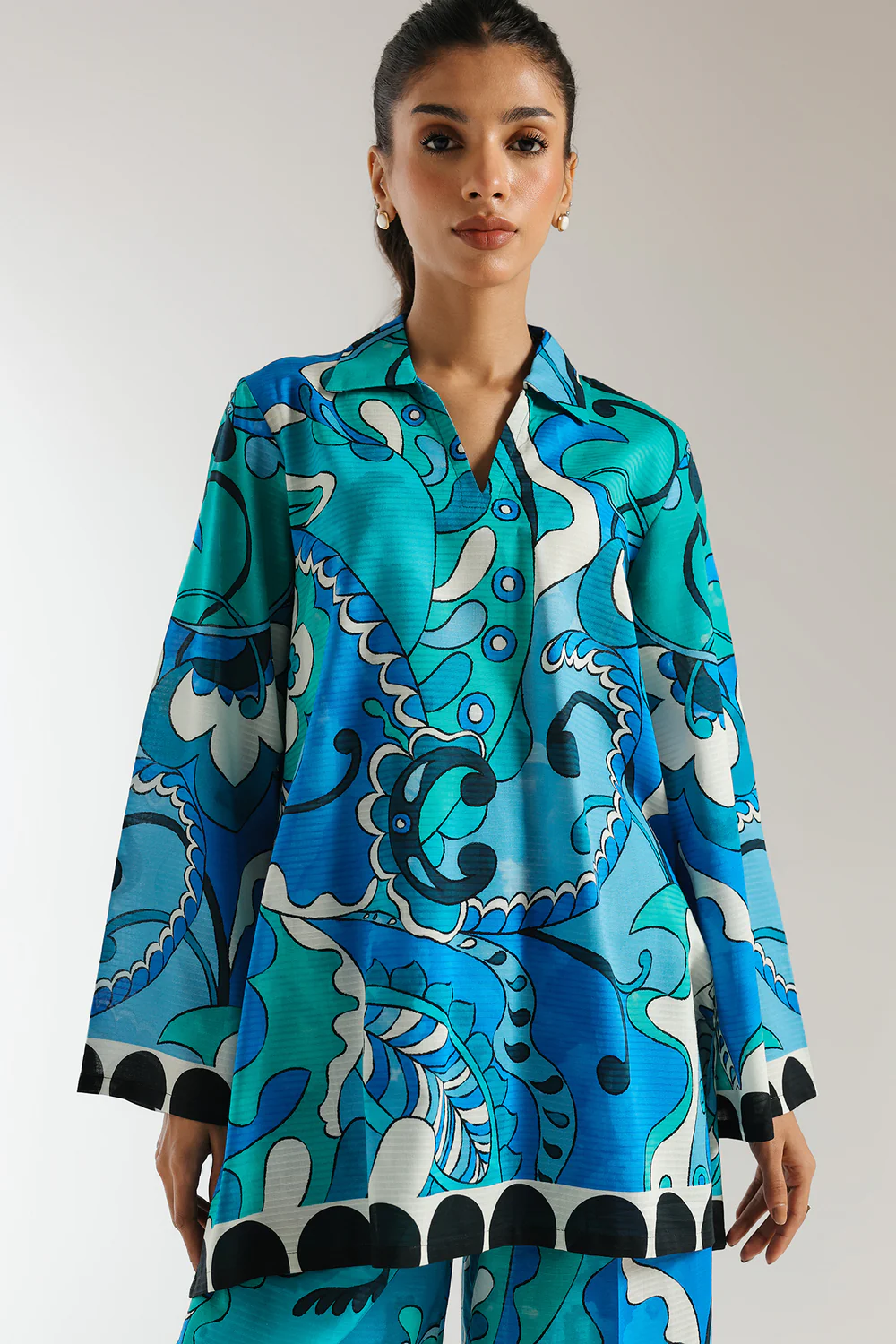 Close-up shot highlighting the vibrant artistic motif and breathable texture of the premium cotton and viscose blend fabric.