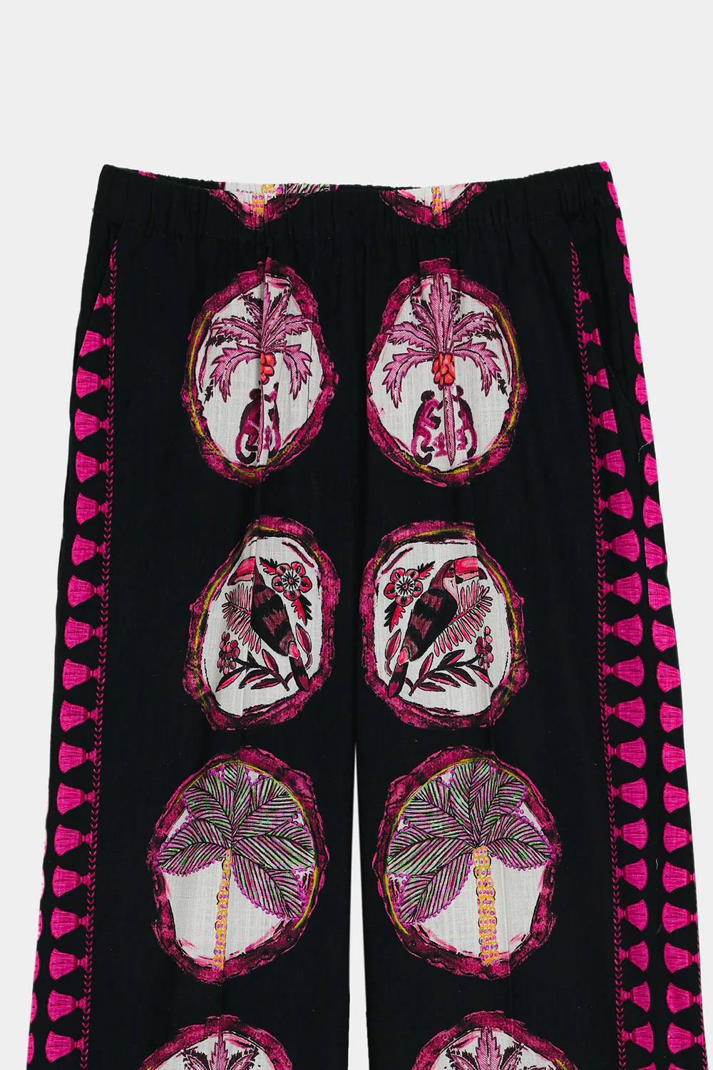 Close-up shot highlighting the rich pink and maroon floral pattern on a deep black, premium fabric canvas.