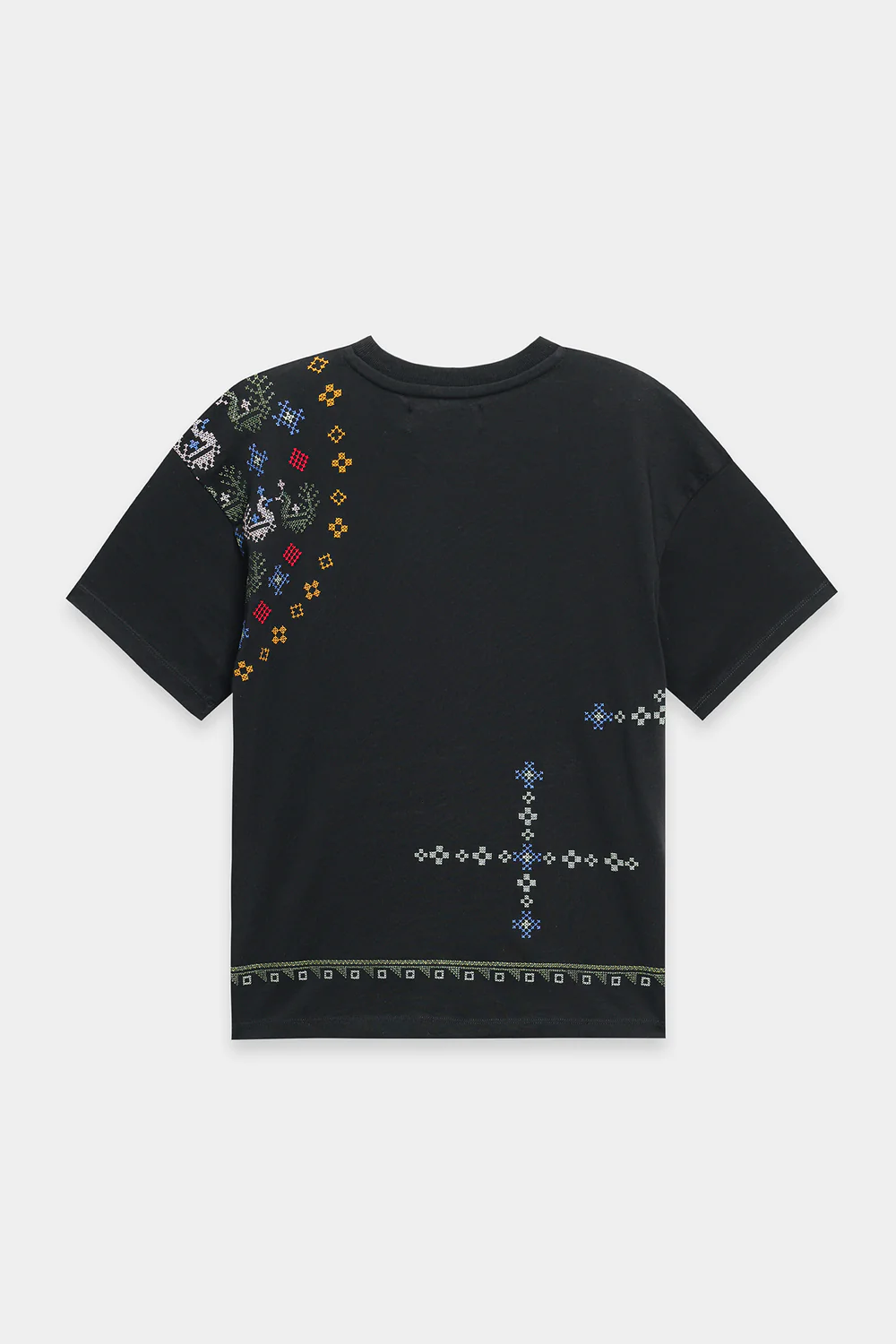 Close-up shot highlighting the intricate, multi-colored geometric and abstract threadwork on the premium deep black textile.