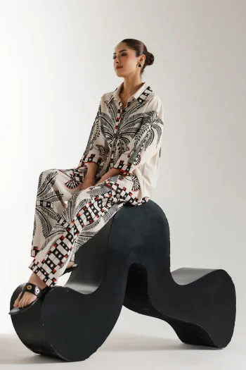 Front studio portrait of Biljiki off-white cotton-viscose floral two-piece set on a 5'6 model.