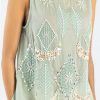 Close-up of embroidery and bead details on aqua kurti