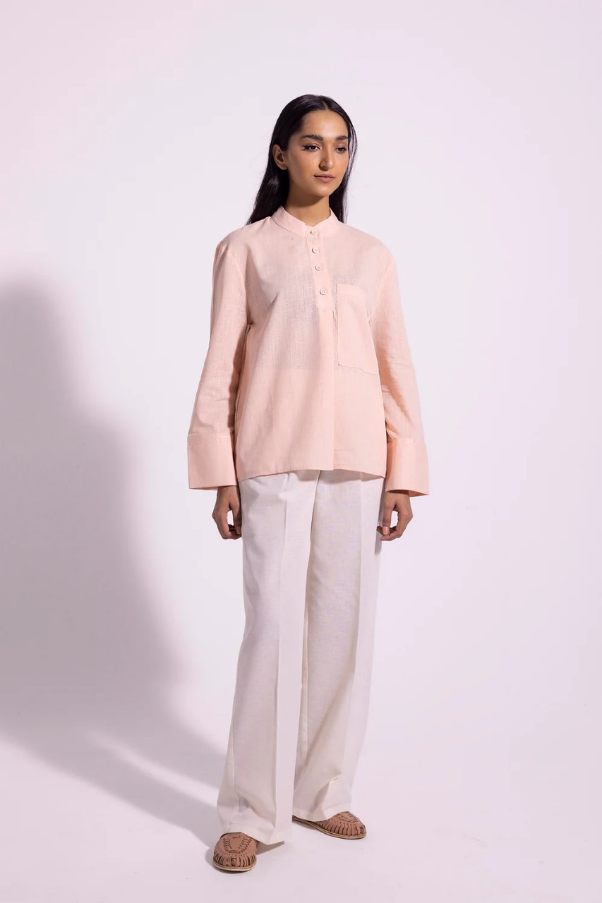 Stylish coral shirt perfect for casual events