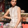 Sleeveless traditional women’s waistcoat with mirror work